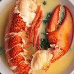 herb infused butter poached lobster tails 2.png
